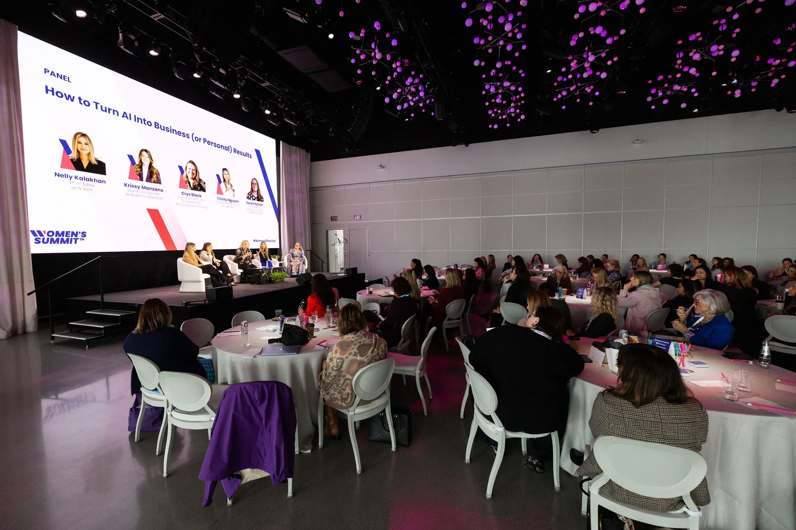 Crys Black on the How to Turn AI Into Business Results panel at Pavilion Women's Summit 2026 in New York, in front of a full room